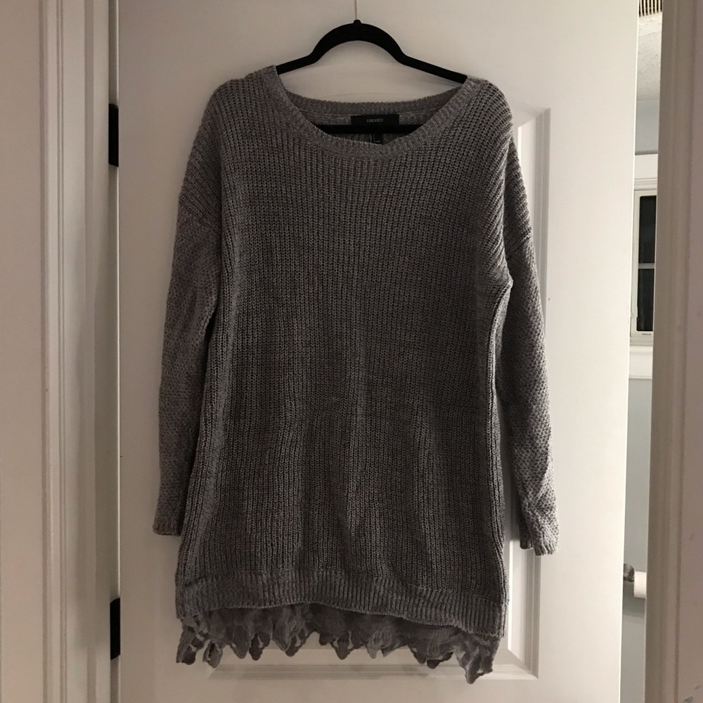 Knit sweater with lace bottom